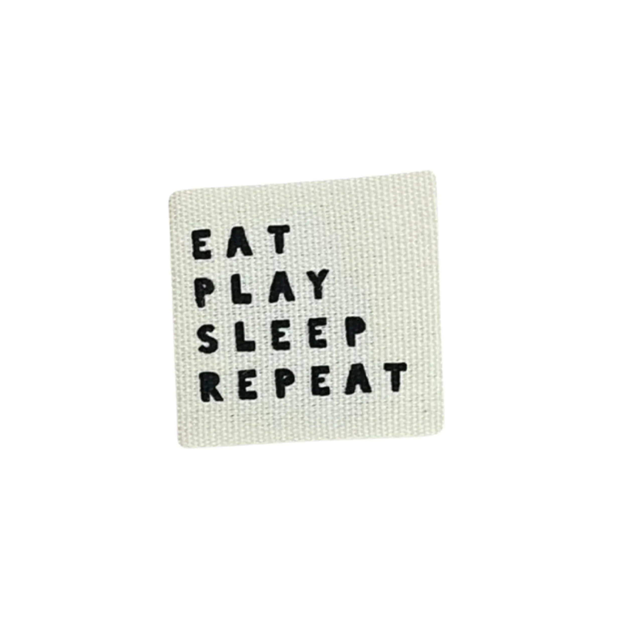 2 Baumwoll-Labels "Eat play sleep repeat"