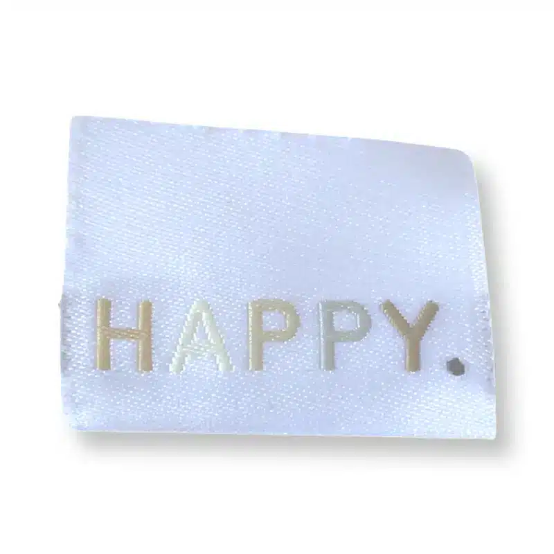 Weblabel weiß mit der Aufschrift happy.
