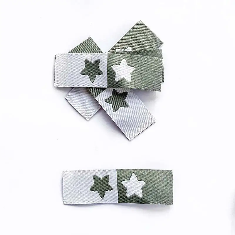 Weblabels sage und weiß mit Aufdruck Stern