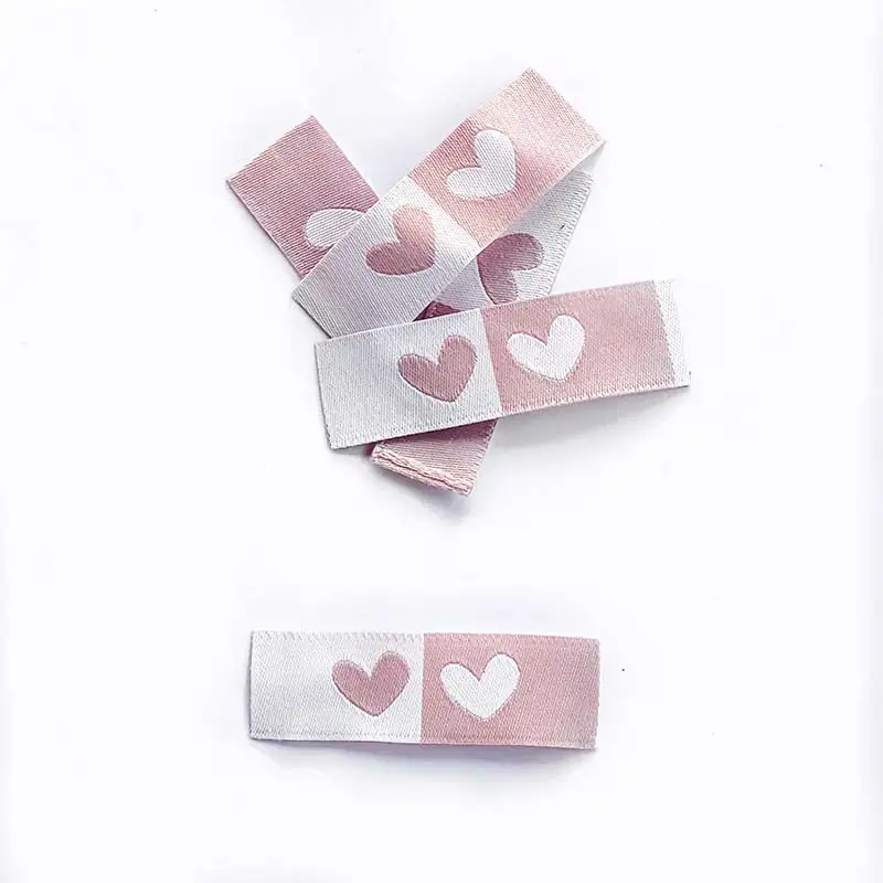 Weblabels rosa und weiß mit Aufdruck Herz